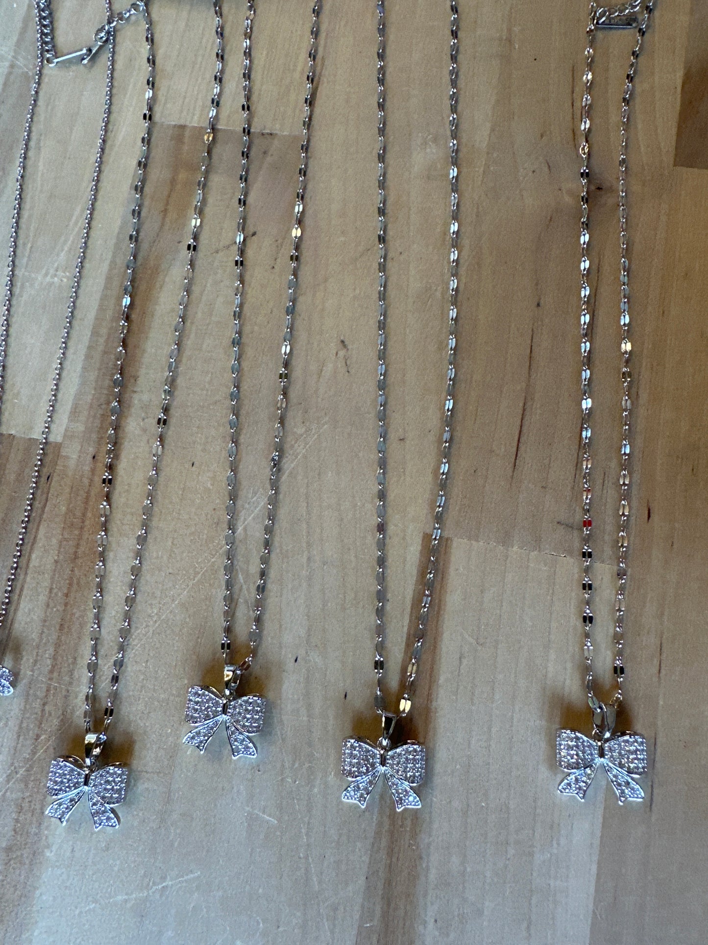 Glimmer Bow Necklace